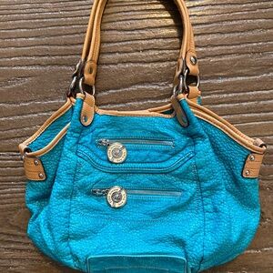 Very cute turquoise Kathy Van Zeeland purse/handbag